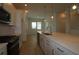 Modern kitchen featuring white cabinets, stainless steel appliances, and island at 3101 4Th N Ter, St Petersburg, FL 33713