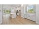 Well-lit kitchen with modern appliances, an island, and an open-concept floor plan at 3101 4Th N Ter, St Petersburg, FL 33713