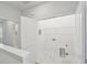 A practical laundry room includes washer and dryer hookups, with a white door and modern marble tile flooring at 3101 4Th N Ter, St Petersburg, FL 33713