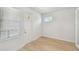 Bright living room with light wood floors and large windows letting in plenty of sunlight at 3101 4Th N Ter, St Petersburg, FL 33713
