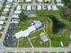 Aerial view of the community's clubhouse, pool, tennis courts, and other recreational facilities at 35149 Wagner Way, Zephyrhills, FL 33541