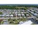 This aerial shot captures a well-maintained community with lush landscaping and convenient parking at 35149 Wagner Way, Zephyrhills, FL 33541