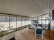 Enclosed patio showing a table, seating, exterior access, and good light at 35149 Wagner Way, Zephyrhills, FL 33541