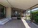 Spacious covered patio with a screen enclosure and a view of the yard at 35149 Wagner Way, Zephyrhills, FL 33541
