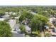 Aerial view of the property showing its mature landscaping, and residential street location at 3806 N Tampa St, Tampa, FL 33603