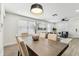 Elegant dining room featuring a stylish table, comfortable chairs, and views into the living area at 3806 N Tampa St, Tampa, FL 33603