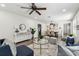 Bright living room with modern furniture, neutral decor, and elegant dining area at 3806 N Tampa St, Tampa, FL 33603