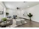 Bright living room with modern furniture, neutral decor, and lots of natural light at 3806 N Tampa St, Tampa, FL 33603