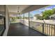 Inviting covered porch with charming railing detail perfect for relaxing outdoors at 3806 N Tampa St, Tampa, FL 33603