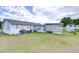 Large backyard provides plenty of room, plus covered patio and an outbuilding at 39423 9Th Ave, Zephyrhills, FL 33542