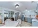 Modern kitchen with stainless steel appliances and tile floor at 39423 9Th Ave, Zephyrhills, FL 33542