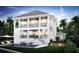 A luxury two-story home featuring a private pool, outdoor seating and lavish landscaping at 4 W Spanish Main St, Tampa, FL 33609