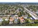 Aerial view showcases a neighborhood with waterfront homes, lush landscaping, and community feel at 4465 1St Ne Way, St Petersburg, FL 33703