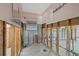 Bathroom features studs, concrete block, terrazzo floor, window and new plumbing at 4465 1St Ne Way, St Petersburg, FL 33703
