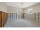 This bedroom features two windows, studs, concrete block, and a terrazzo floor at 4465 1St Ne Way, St Petersburg, FL 33703
