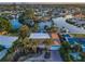 Stunning aerial view of this home showcases its prime waterfront location with waterway access and a beautiful community at 4772 Dover Ne St, St Petersburg, FL 33703