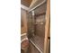 This bathroom features a sliding glass shower door and tile surround at 4772 Dover Ne St, St Petersburg, FL 33703