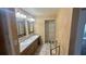 Bathroom featuring double sinks, vanity, and ample cabinet space at 4772 Dover Ne St, St Petersburg, FL 33703