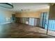 Bright living room with a ceiling fan and updated flooring, featuring great remodeling potential at 4772 Dover Ne St, St Petersburg, FL 33703