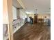 Spacious living room featuring hardwood floors, updated lighting, and ready for remodel at 4772 Dover Ne St, St Petersburg, FL 33703