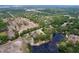 An aerial view shows houses and trees at 5058 Westlake Blvd, Dade City, FL 33523