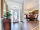 The home's foyer opens up to reveal high ceilings and lots of natural light at 5058 Westlake Blvd, Dade City, FL 33523
