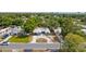 Aerial view of house, showcasing a well-manicured lawn and circular driveway at 5826 20Th S Ave, Gulfport, FL 33707