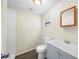 Bright bathroom features modern vanity, wood-look floors, and shower at 601 Newton S Ave, St Petersburg, FL 33701