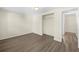 Bedroom featuring wood-look floors and closet at 601 Newton S Ave, St Petersburg, FL 33701