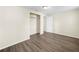 Bedroom featuring wood-look floors, closet and a door at 601 Newton S Ave, St Petersburg, FL 33701