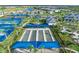 Overhead view of the community's bocce ball courts and recreational facilities near residential areas at 6017 Silver Grass Ct, Nokomis, FL 34275