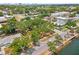 Scenic waterfront lot with mature trees, showcasing stunning views of the water and surrounding community at 602 & 604 Channel Dr, Tampa, FL 33606