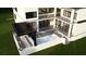 Stunning outdoor space with pool, modern pergola, and an outdoor fireplace for ultimate relaxation at 602 & 604 Channel Dr, Tampa, FL 33606