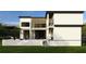 An exterior view of the home shows a covered patio and tiered balconies at 602 & 604 Channel Dr, Tampa, FL 33606