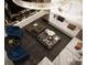 Modern open living area with decorative coffee tables and hanging chandelier at 602 & 604 Channel Dr, Tampa, FL 33606