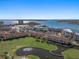 Expansive aerial view showcasing the community with golf course, water features, and waterfront residences at 6021 Bahia Del Mar Cir # 238, St Petersburg, FL 33715
