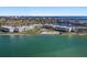Stunning aerial view of beachfront condos, showcasing the turquoise waters and lush landscaping at 6021 Bahia Del Mar Cir # 238, St Petersburg, FL 33715