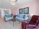 Inviting living room featuring plush seating, views into the dining area, and a comfortable atmosphere at 6021 Bahia Del Mar Cir # 238, St Petersburg, FL 33715