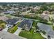 Aerial view of a neighborhood showcasing well-maintained homes and mature trees at 6332 35Th Avenue E Cir, Palmetto, FL 34221