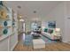 Bright living room with stylish decor, hardwood floors, and plenty of natural light at 6332 35Th Avenue E Cir, Palmetto, FL 34221