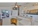 Bright living room featuring tile floors, neutral decor, and sliding glass doors to the pool at 6332 35Th Avenue E Cir, Palmetto, FL 34221