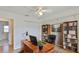 Office space with wood desk, shelves filled with books, and a comfortable executive chair at 6332 35Th Avenue E Cir, Palmetto, FL 34221