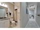 Cozy bathroom with a shower and tub combination, featuring a nautical-themed shower curtain at 6507 Maiden Sea Dr, Apollo Beach, FL 33572