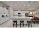 Open kitchen with white cabinets, a center island, and stainless steel appliances at 6507 Maiden Sea Dr, Apollo Beach, FL 33572