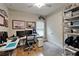 Home office with dual monitors, built-in closet, and natural light at 6507 Maiden Sea Dr, Apollo Beach, FL 33572