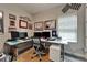 Home office with dual monitors, racing decor, and natural light at 6507 Maiden Sea Dr, Apollo Beach, FL 33572