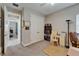 Home office featuring neutral paint, desk, shelving, and closet at 6507 Maiden Sea Dr, Apollo Beach, FL 33572