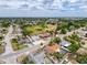 An aerial shot highlights a single-Gathering home in a tranquil neighborhood near green spaces and community amenities at 7237 Bramblewood Dr, Port Richey, FL 34668