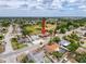 An aerial shot highlights a single-Gathering home in a tranquil neighborhood near green spaces and community amenities at 7237 Bramblewood Dr, Port Richey, FL 34668