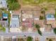 A bird's-eye view of a single-Gathering home with a spacious fenced backyard in a quiet residential neighborhood at 7237 Bramblewood Dr, Port Richey, FL 34668